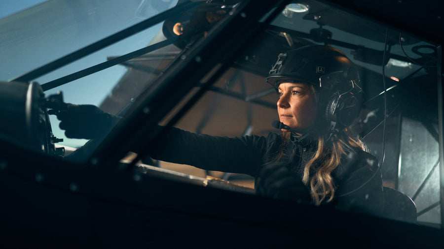 Pilot flying with a Sky Cowboy helmet on