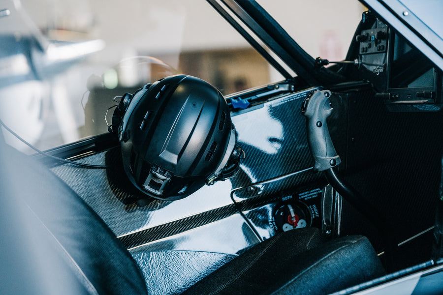 Helmet and headset resting in the cockpit