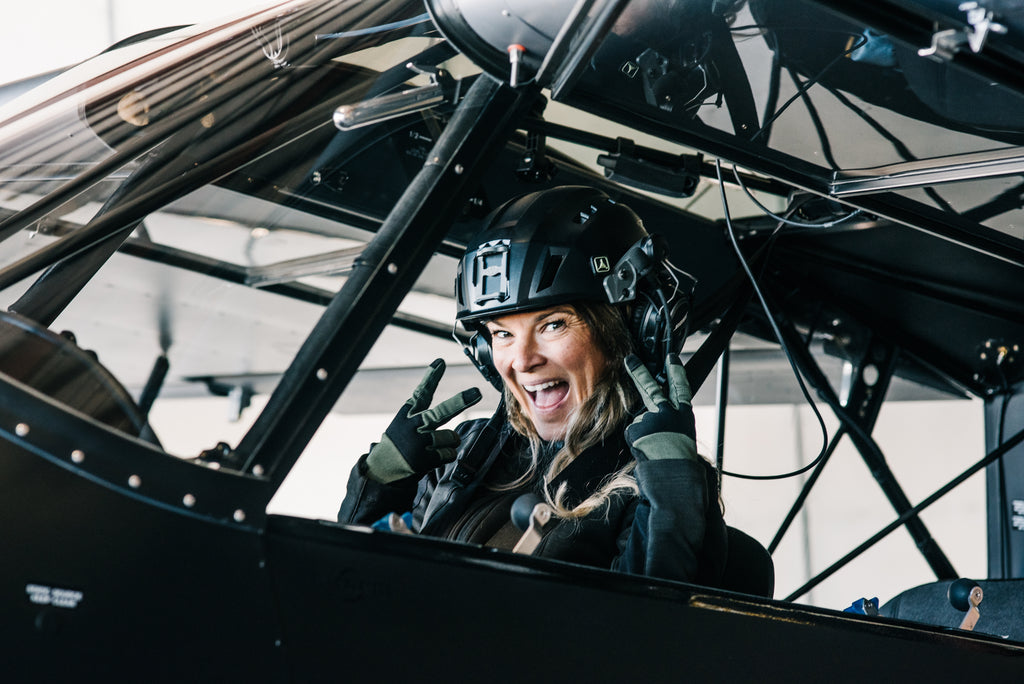 Pilot wearing the helmet in flight